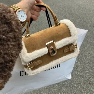 sac à main en daim marron et blanc