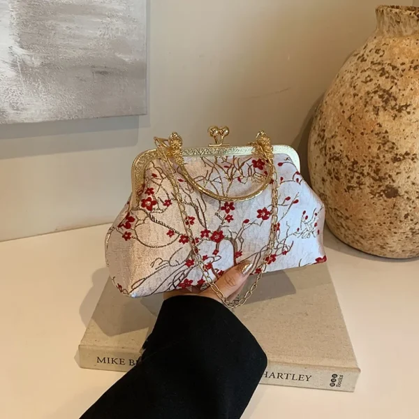 sac à main velours blanc et rouge élégant style fleurs de cerisier