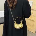 accessoire de mode sac à main doré