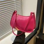 sac à main élégant vernis rose fuchsia