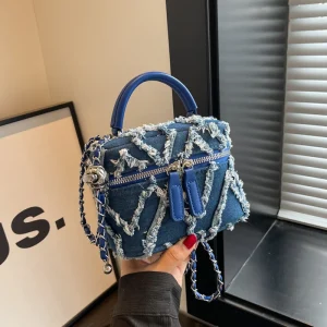sac à main en jean bleu marine effilochés