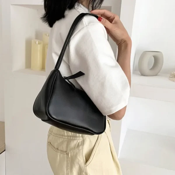 sac épaule noir style minimaliste