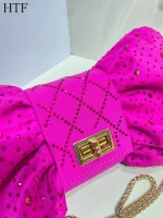 pochette élégante femme nœud papillon