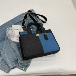 sac à main bandoulière en jean noir et bleu