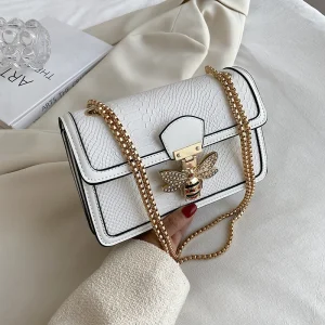 sac à main en cuir blanc effet python