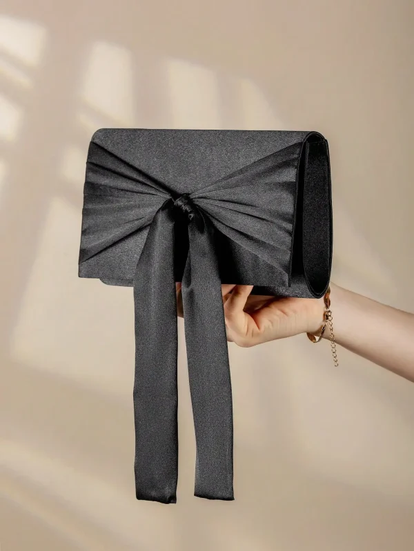 sac à main soirée noir avec grand nœud élégant