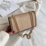 sac à main avec fermoir abeille dorée