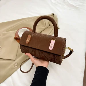sac à main en daim marron cylindrique
