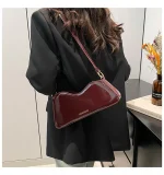 pochette bordeaux bandoulière ajustable