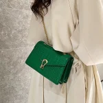 sac en cuir vert avec fermoir original