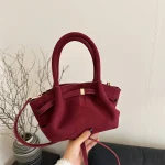sac à main en daim bordeaux